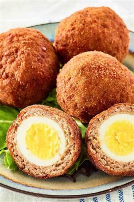  Scotch Egg Lụa Bóng: Một Vị Hoài Cổ Thổi Sôi Trên Tấm Đá Nung Chanh Sa